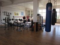 The arena at Joe's Boxing Gym, where the members have sweat nearly an Olympic pool for the last 20 years.